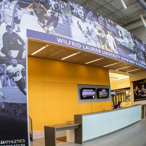 60ft mural across the front entrace to Laurier's Athletic Complex